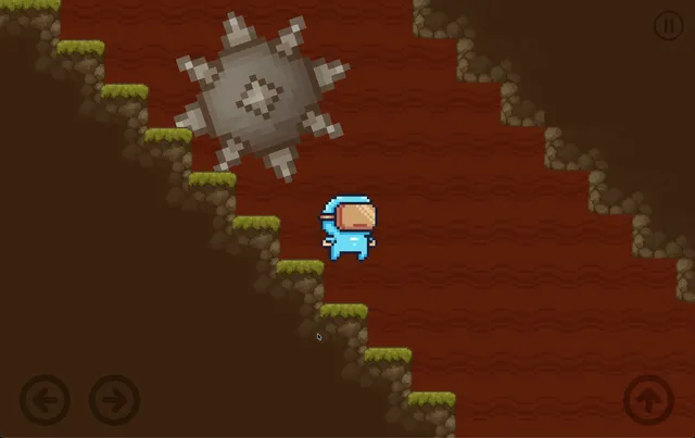 The player navigating a lava-cave level next to a spinning spiked hazard, with sloped grass-and-dirt platforms on either side.